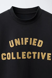 VARSITY INTERLOCK DOUBLE SLEEVE SWEATSHIRT