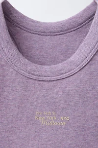 TEXT SEAMLESS CROP TOP