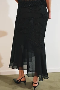 JUPE MI-LONGUE À VOLANTS ET FANTAISIE