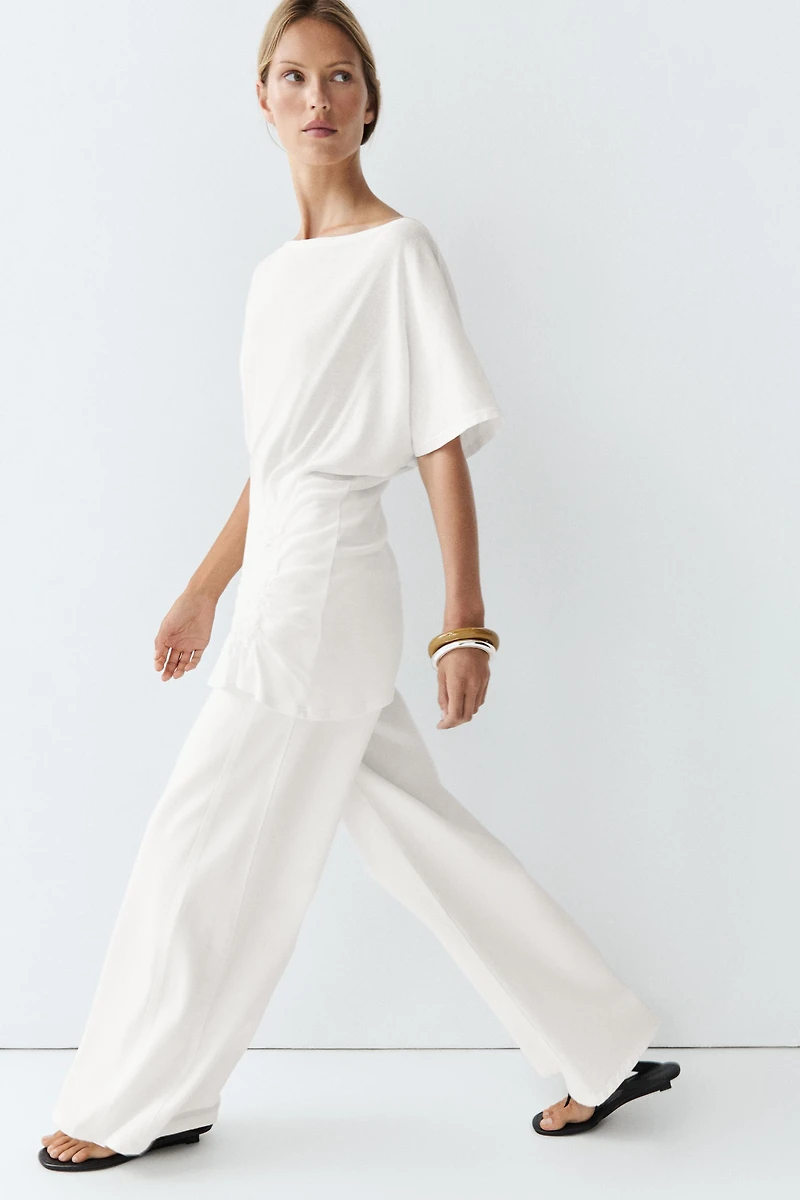 Top asymétrique avec broderie