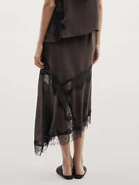 Flowing asymmetric midi skirt with lace detail