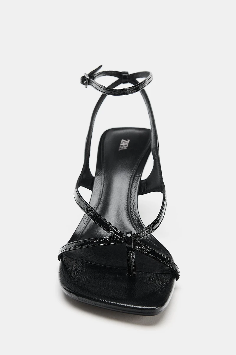 SANDALES EN CUIR À TALONS