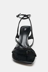 SANDALES EN CUIR À TALONS