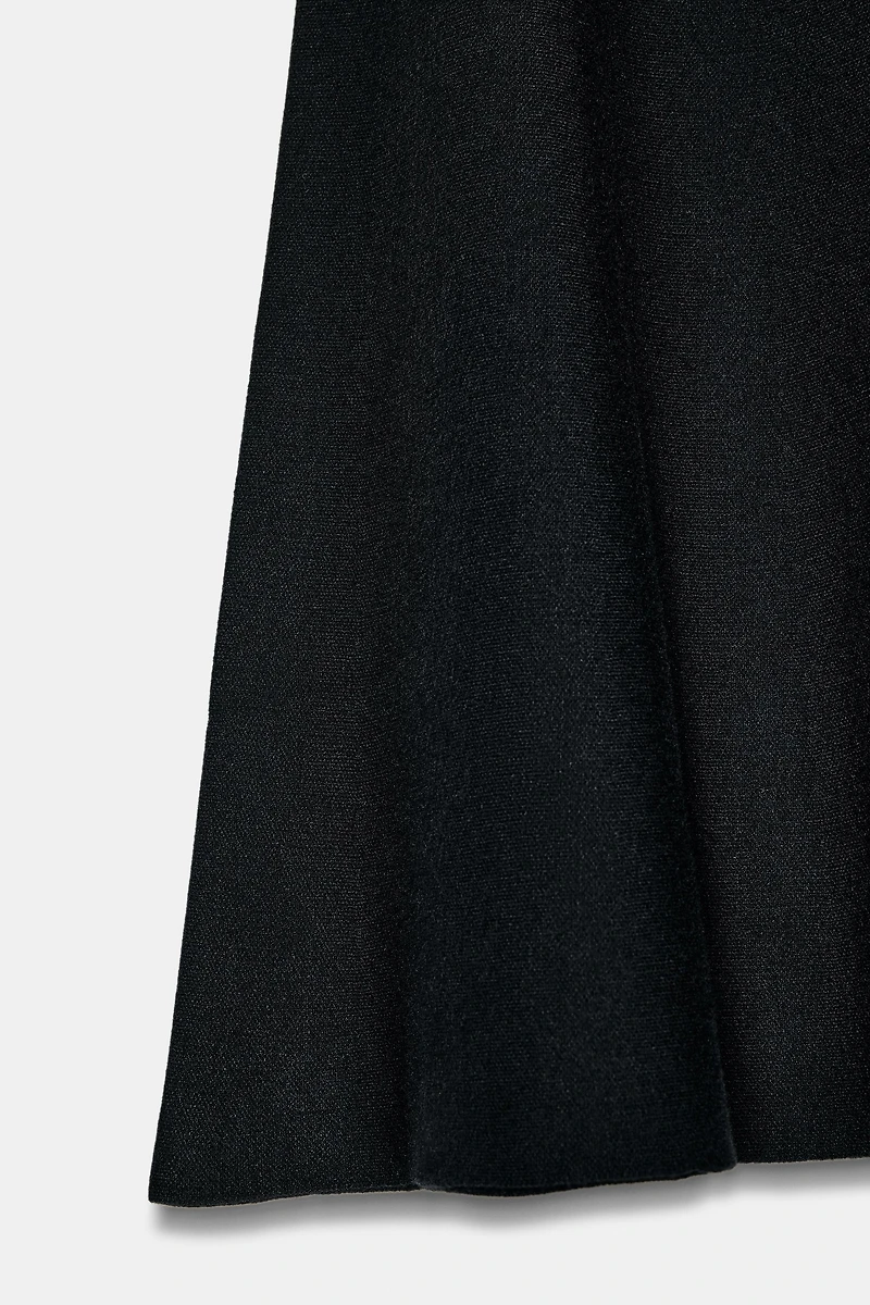 JUPE MI-LONGUE ÉVASÉE EN MAILLE