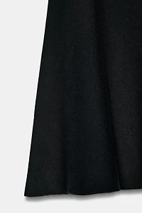 JUPE MI-LONGUE ÉVASÉE EN MAILLE