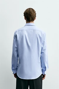 CHEMISE SLIM À POIGNETS BOUTON DE MANCHETTE