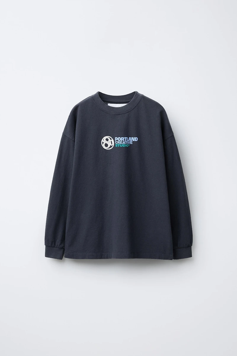 T-SHIRT À INSCRIPTION EN RELIEF