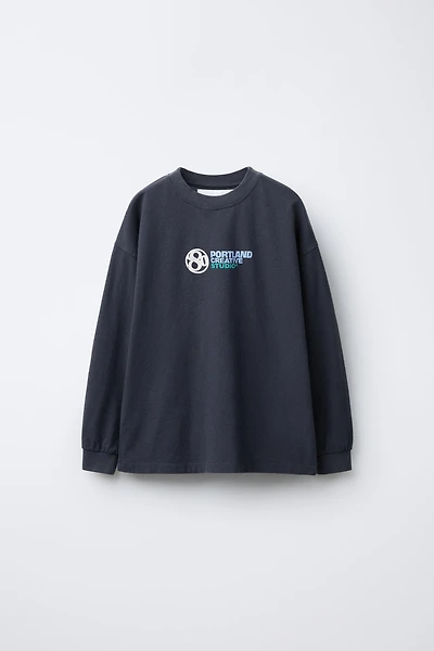 T-SHIRT À INSCRIPTION EN RELIEF