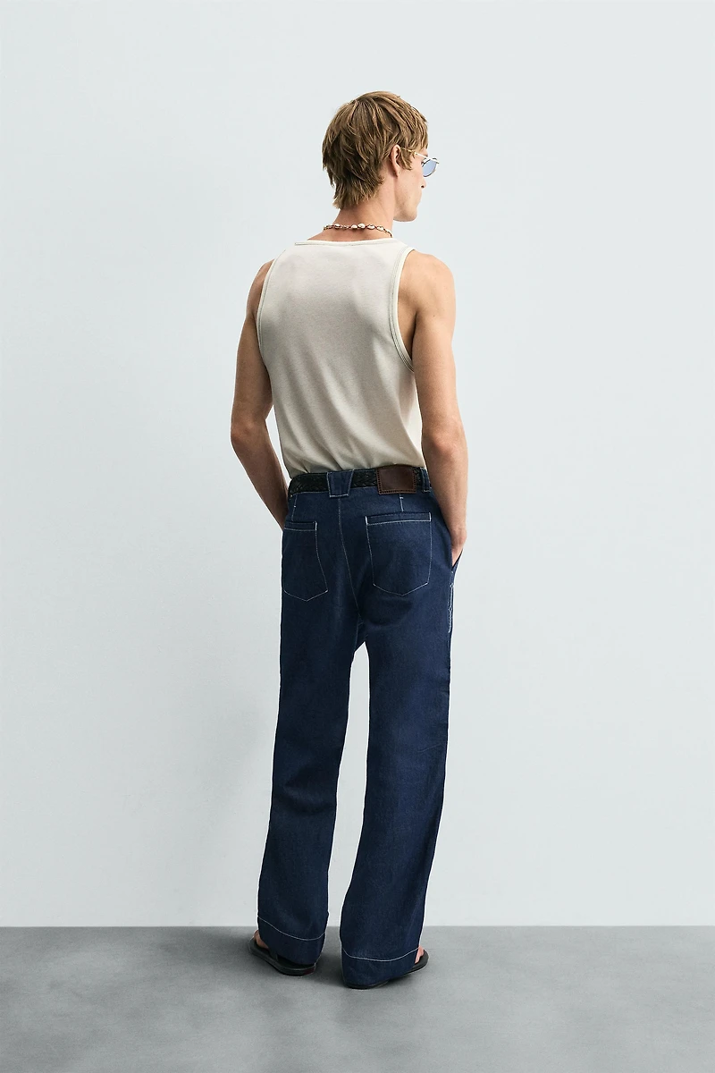 EMBROIDERED BAND DETAIL JEANS