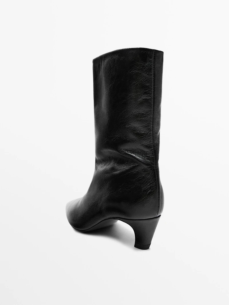 Leather high heel ankle boots