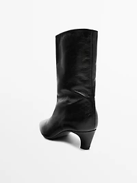 Leather high heel ankle boots