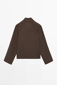 Flowing loose-fitting linen wrap blouse