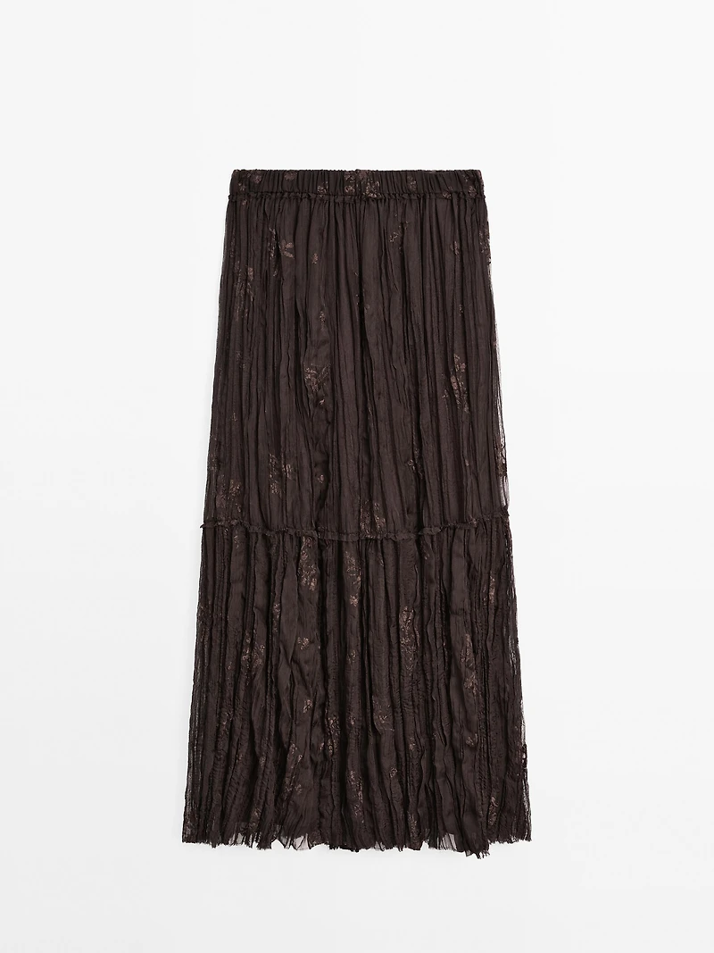 Long pleated skirt with embroidered detail
