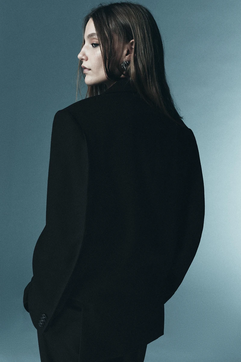 LIMITED EDITION WOOL PLEATED PANTS