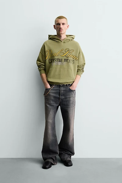 WASHED PRINTED TEXT SWEATSHIRT