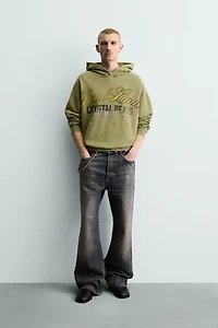 WASHED PRINTED TEXT SWEATSHIRT