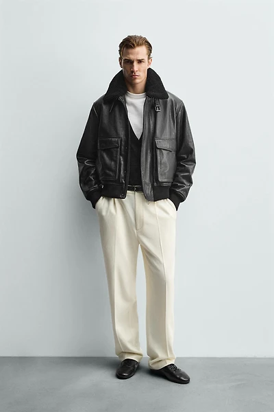 BLOUSON EN CUIR AVEC COL BIMATIÈRE