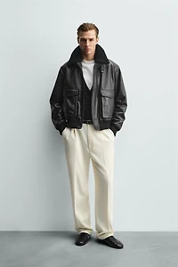 BLOUSON EN CUIR AVEC COL BIMATIÈRE