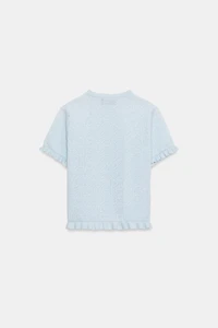 VESTE EN MAILLE STRUCTURÉE À VOLANTS