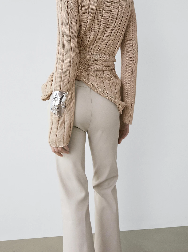 Mid-waist waxed flared pants
