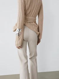Mid-waist waxed flared pants