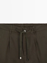Total look linen Bermuda shorts with elasticated detail