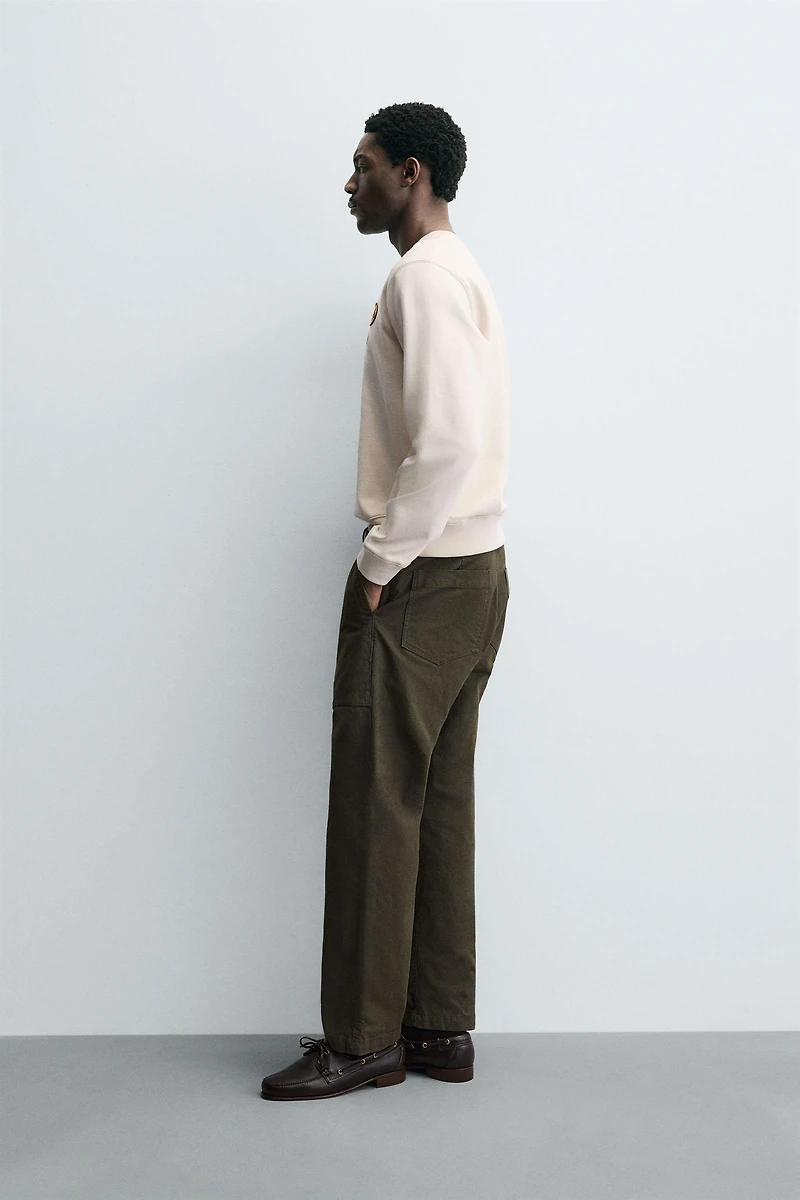 SWEAT À INSCRIPTION BRODÉE