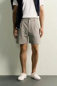 TEXTURED PLAID PLEATED SHORTS