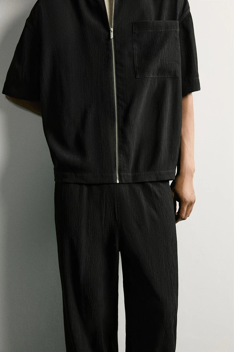 TEXTURED RELAXED FIT PANTS
