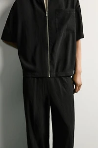 TEXTURED RELAXED FIT PANTS