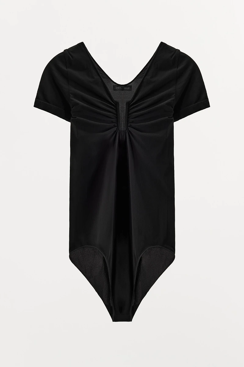 STOCKING BODYSUIT WITH METAL APPLIQUÉ