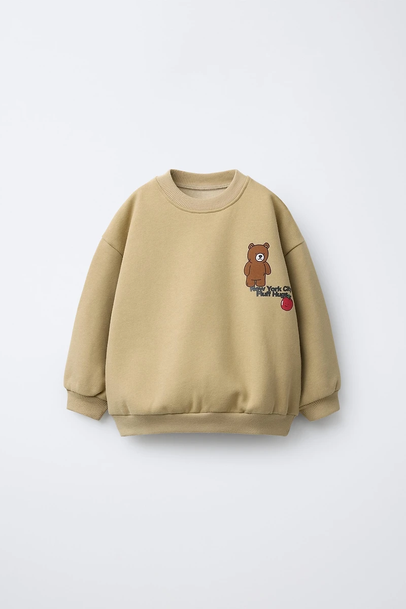 ANIMAL PRINT SWEATSHIRT