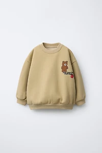 ANIMAL PRINT SWEATSHIRT