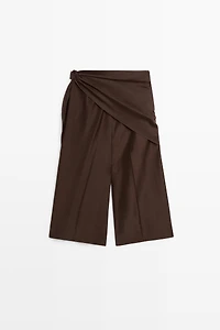 Long flowing Bermuda shorts with scarf detail