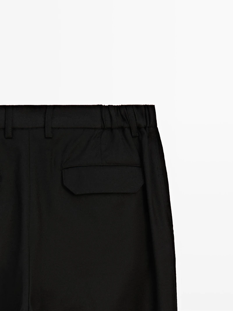 Relaxed fit wool blend darted trousers