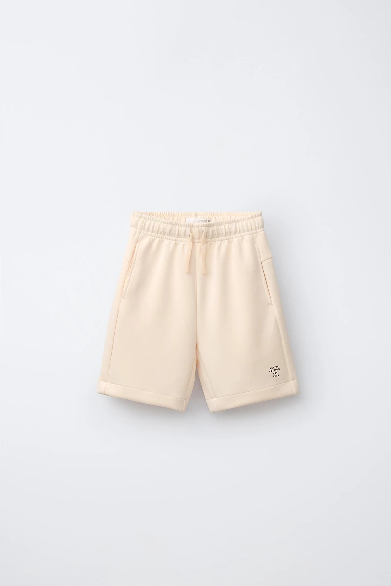 ATHLETIC TEXT SHORTS