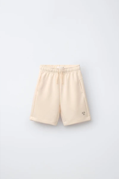 ATHLETIC TEXT SHORTS
