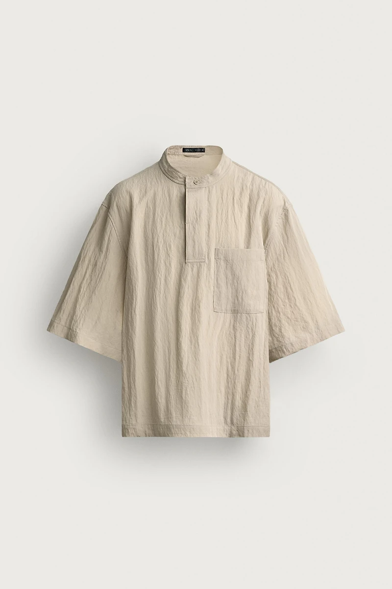 FLOWY POLO SHIRT