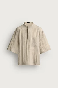 FLOWY POLO SHIRT