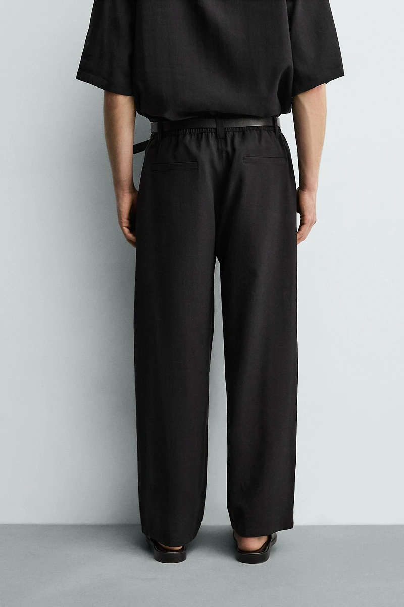 FLOWY PANTS WITH SIDE PLEATS