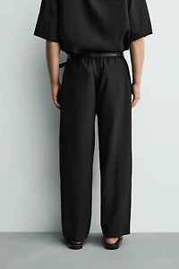 FLOWY PANTS WITH SIDE PLEATS