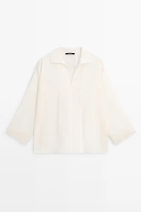 Flowing blouse with seam details