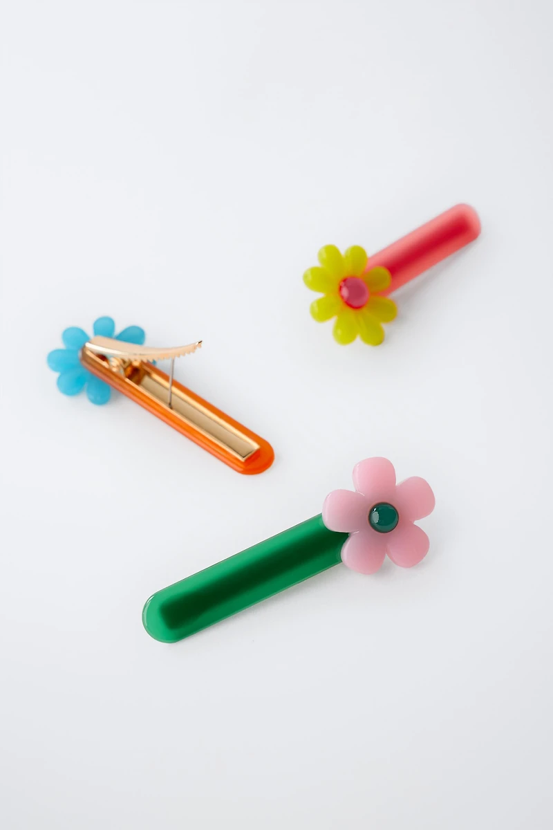 LOT DE TROIS PINCES FLEURS