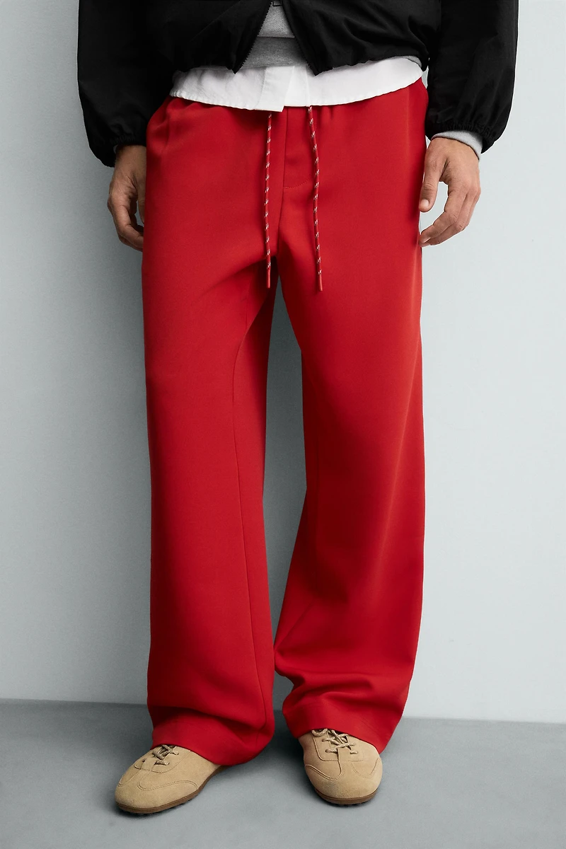 WIDE FIT JOGGER PANTS WITH SIDE STRIPES