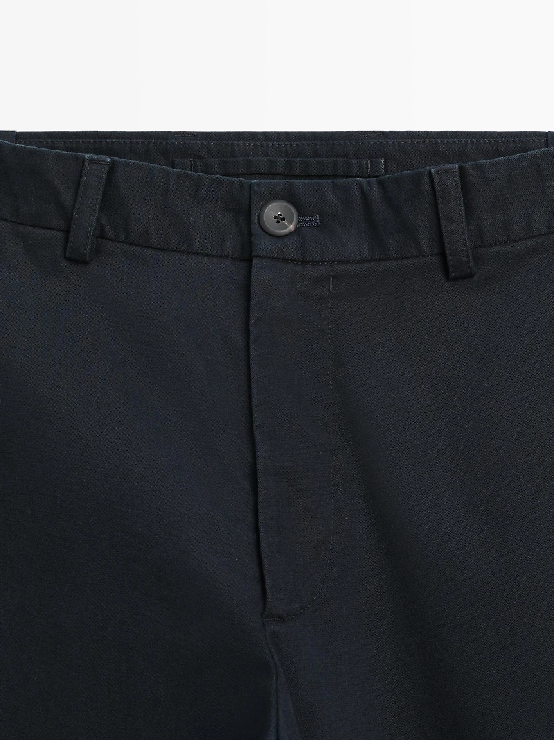 Slim fit trousers with elastic side detail