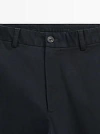 Slim fit trousers with elastic side detail