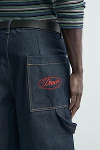 EMBROIDERED POCKET DENIM JORTS