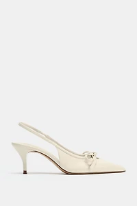 CHAUSSURES OUVERTES À L'ARRIÈRE NŒUD