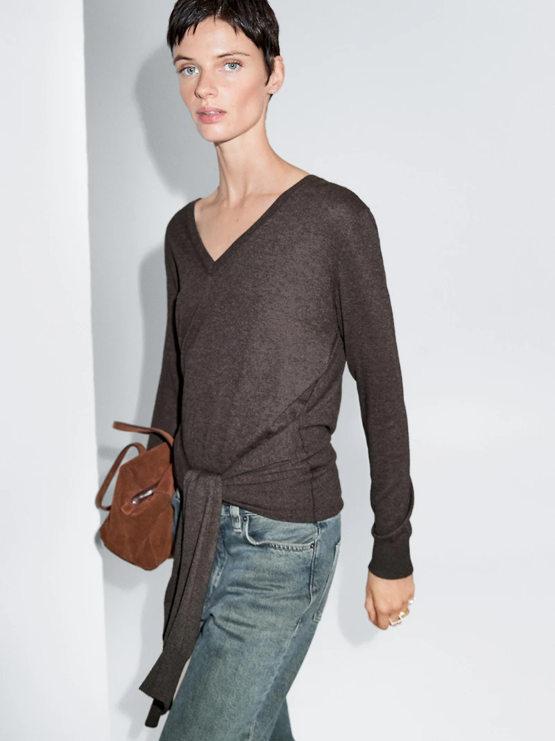 Knit sweater with multiway sleeves