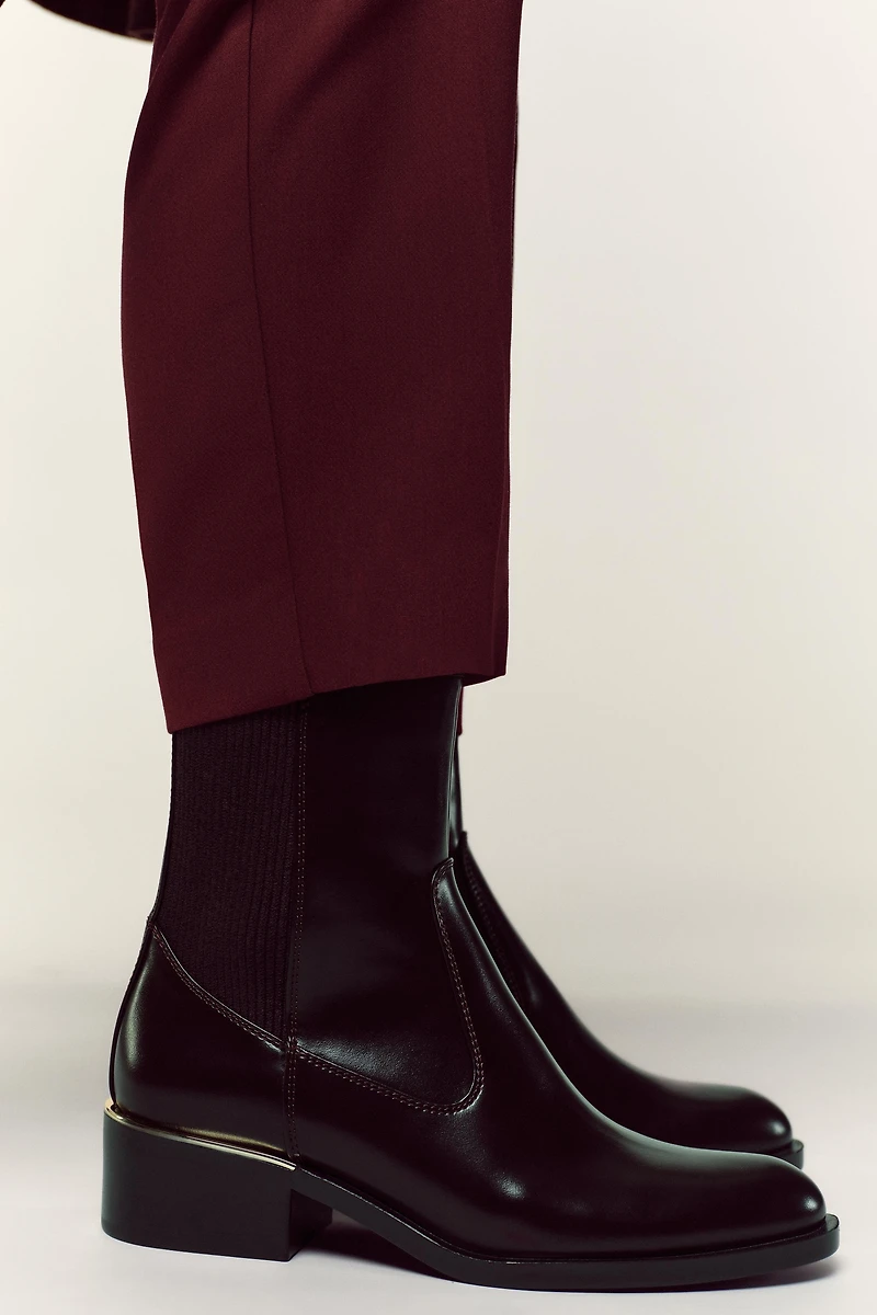 LOW HEELED ANKLE BOOTS WITH METALLIC DETAIL